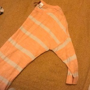 Quarter sleeve orange and white shirt